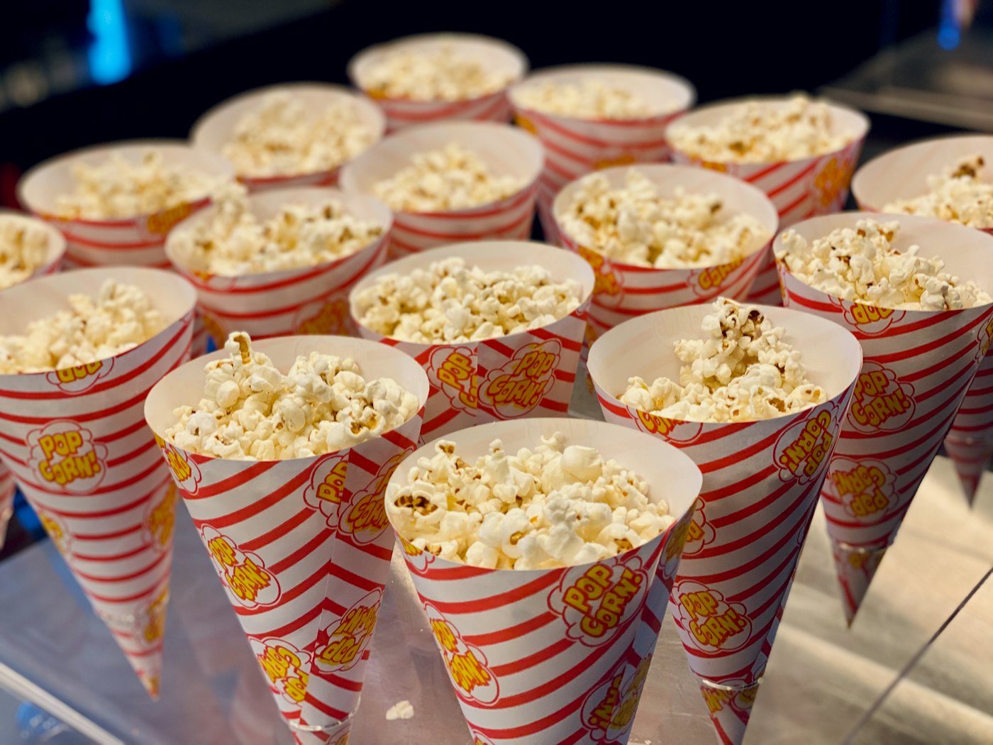 Cones of freshly popped popcorn ready to eat